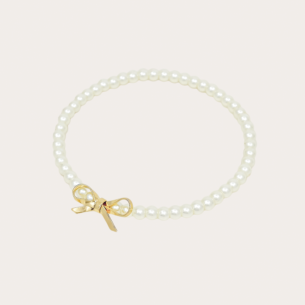 Dainty Pearl Stretch Bracelet with Gold Bow Charm