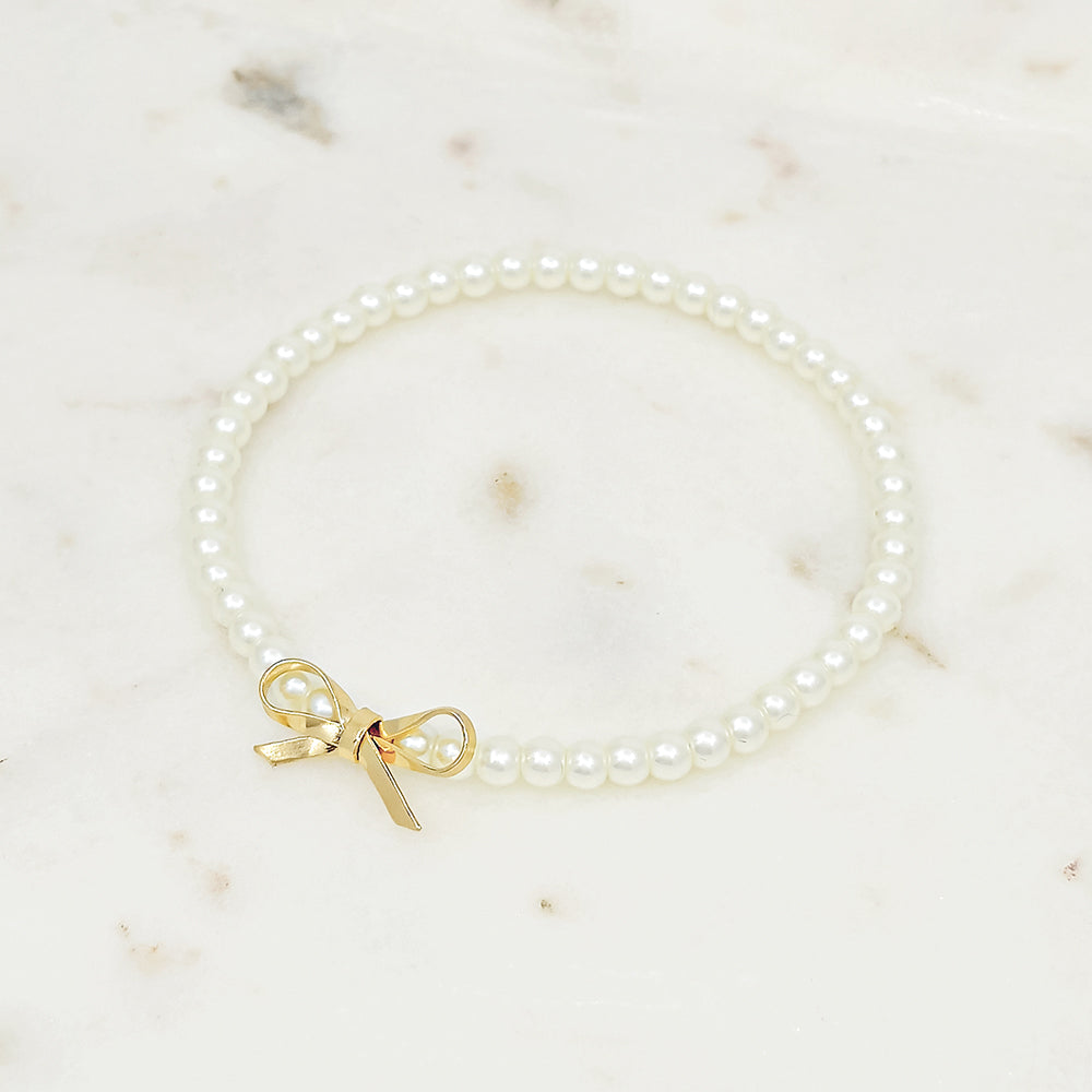 Dainty Pearl Stretch Bracelet with Gold Bow Charm