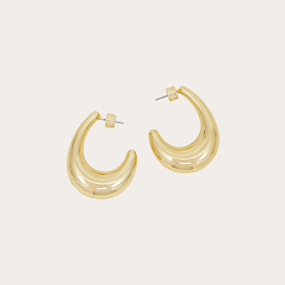 Bold teardrop sculptural hoop earrings