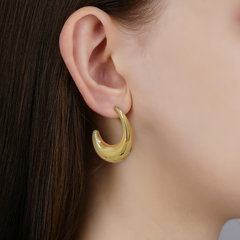 Bold teardrop sculptural hoop earrings