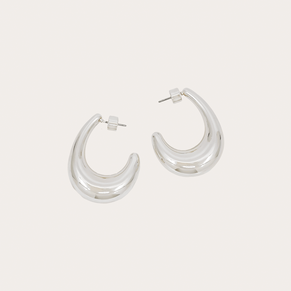 Bold teardrop sculptural hoop earrings